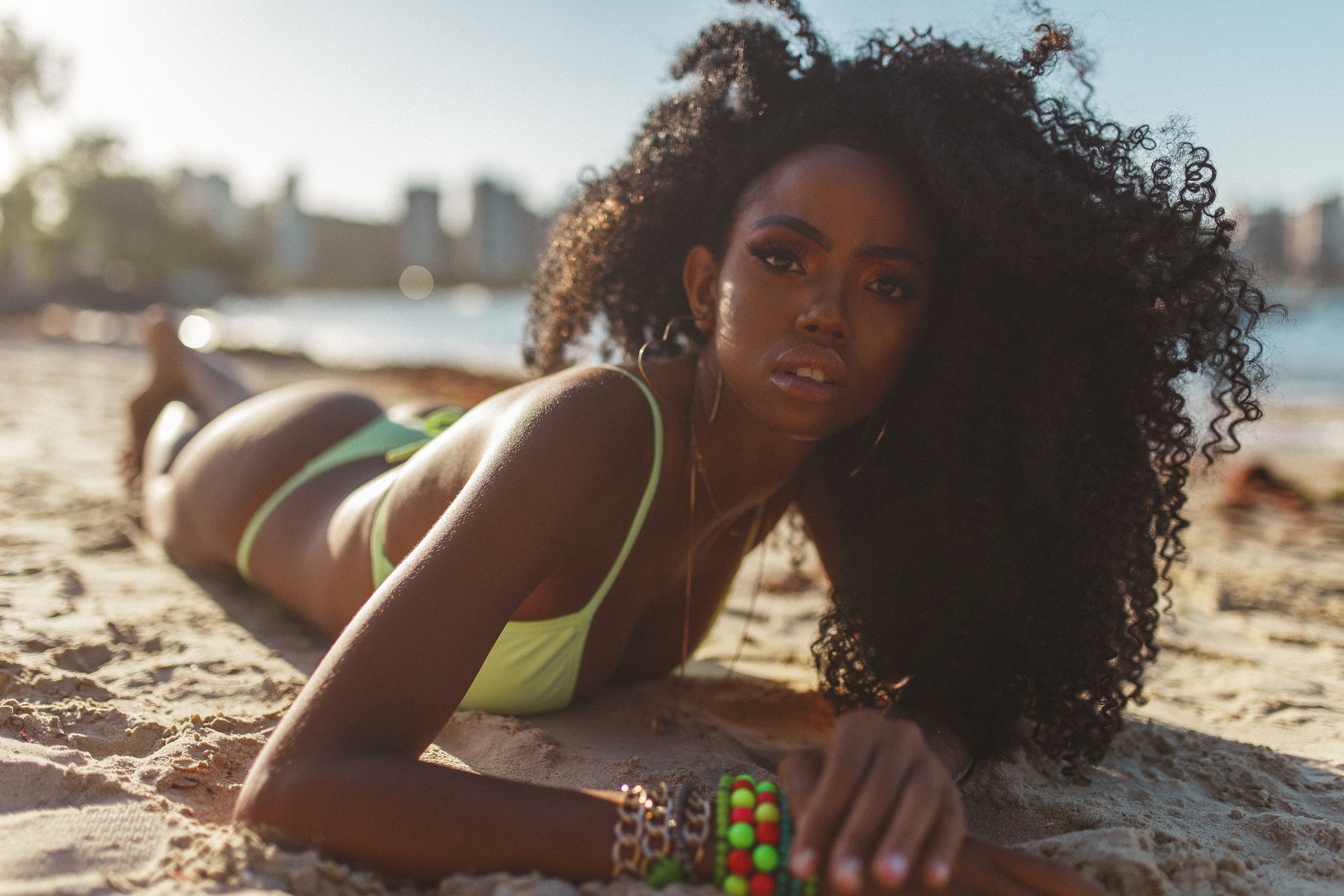 photo-of-woman-lying-on-the-beach-1855881 photo-of-woman-lying-on-the-beach-1855881